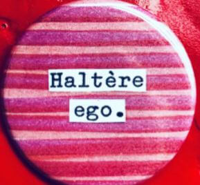 badge haltère égo.